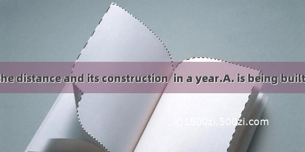 A bridge  in the distance and its construction  in a year.A. is being built; will be finis